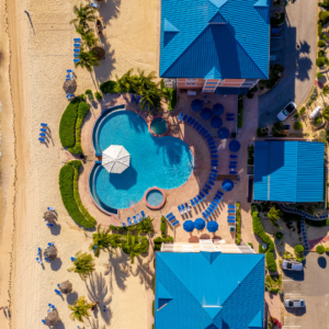 overhead view of beach resort with pool