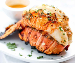 cooked lobster tail with butter sauce