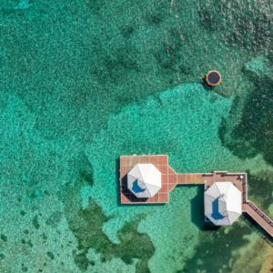 overhead view of Mimi's Dock Bar on the ocean in the Cayman Islands